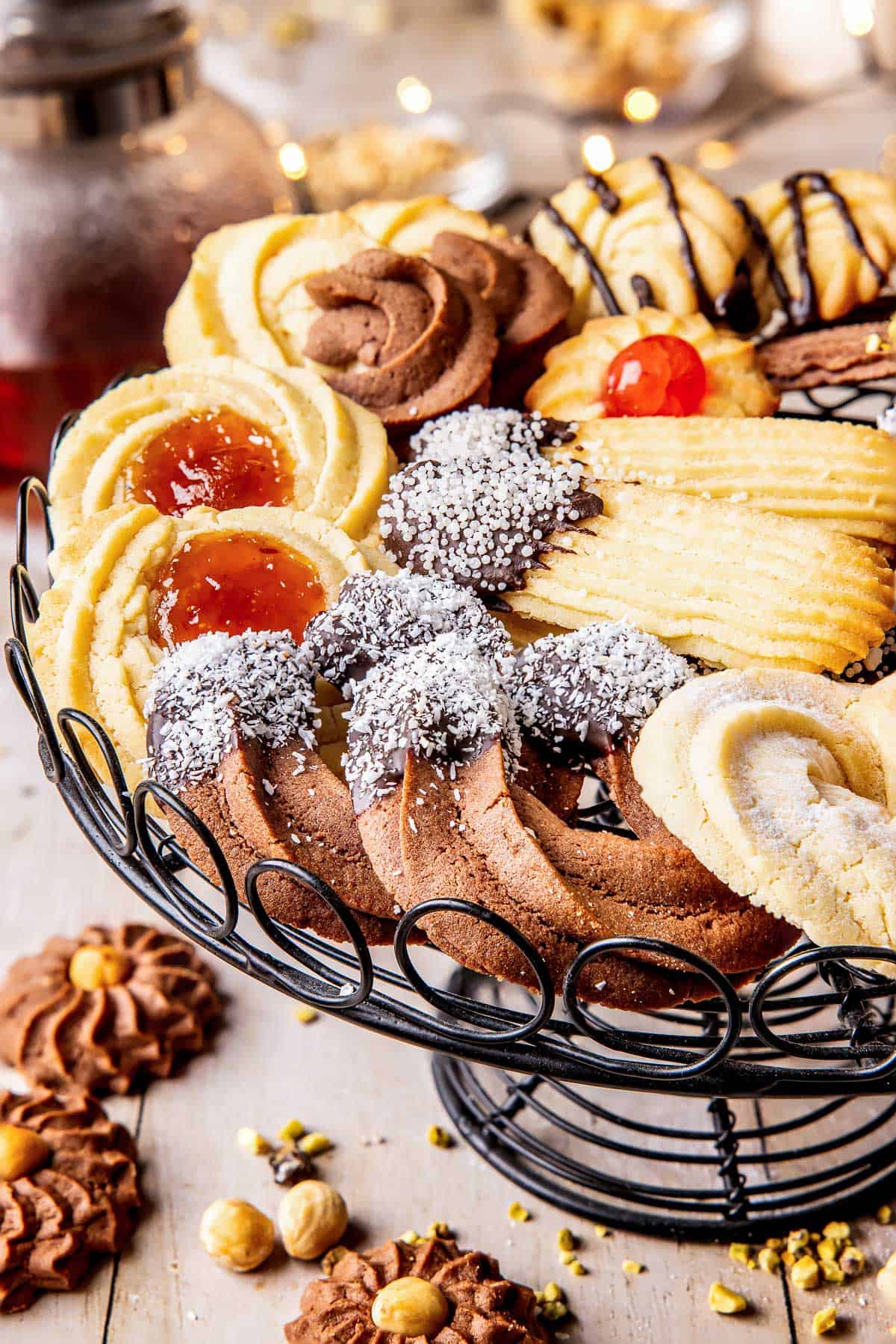 Italian butter cookies of different shapes on a cookie tray.