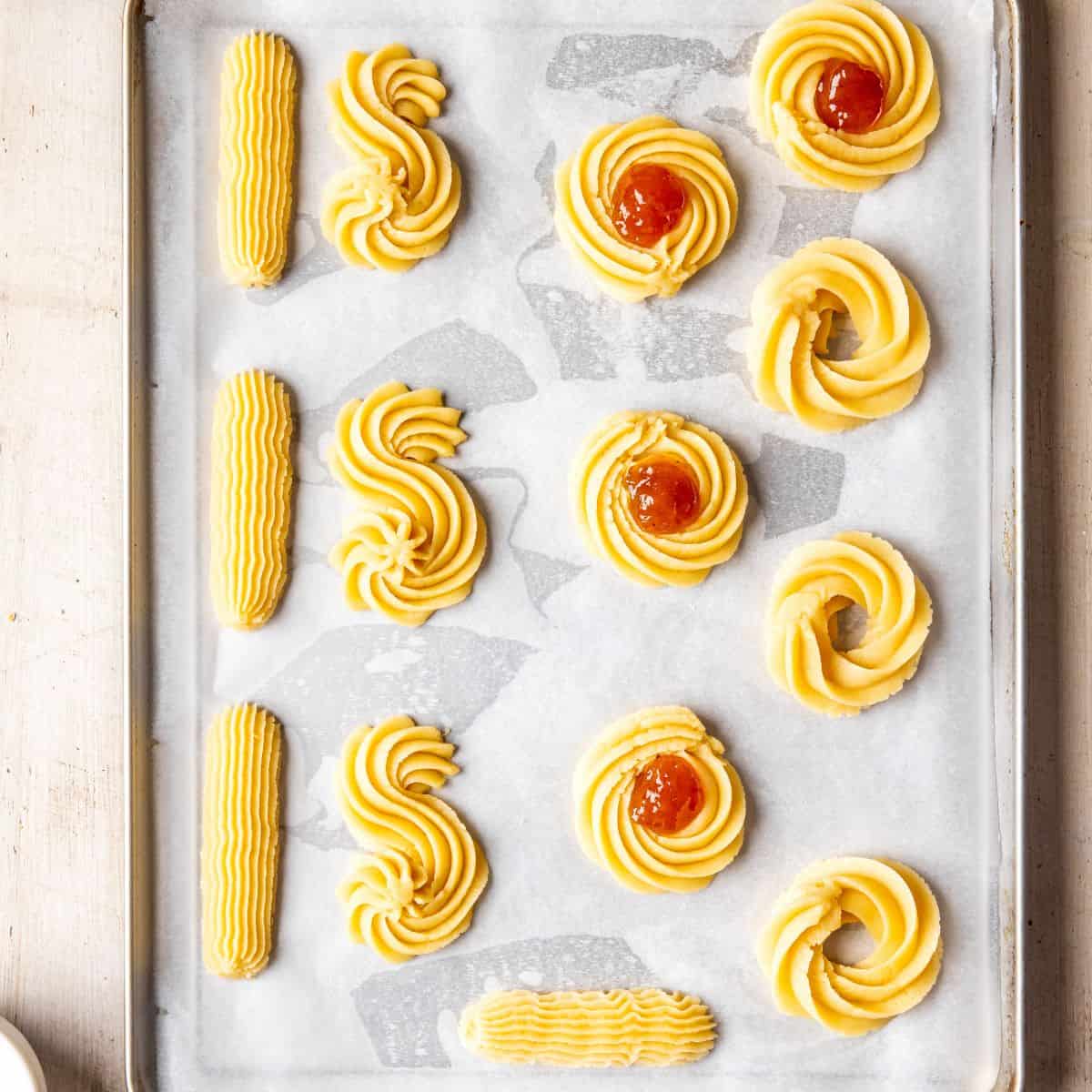 Italian butter cookies on a baking sheet.