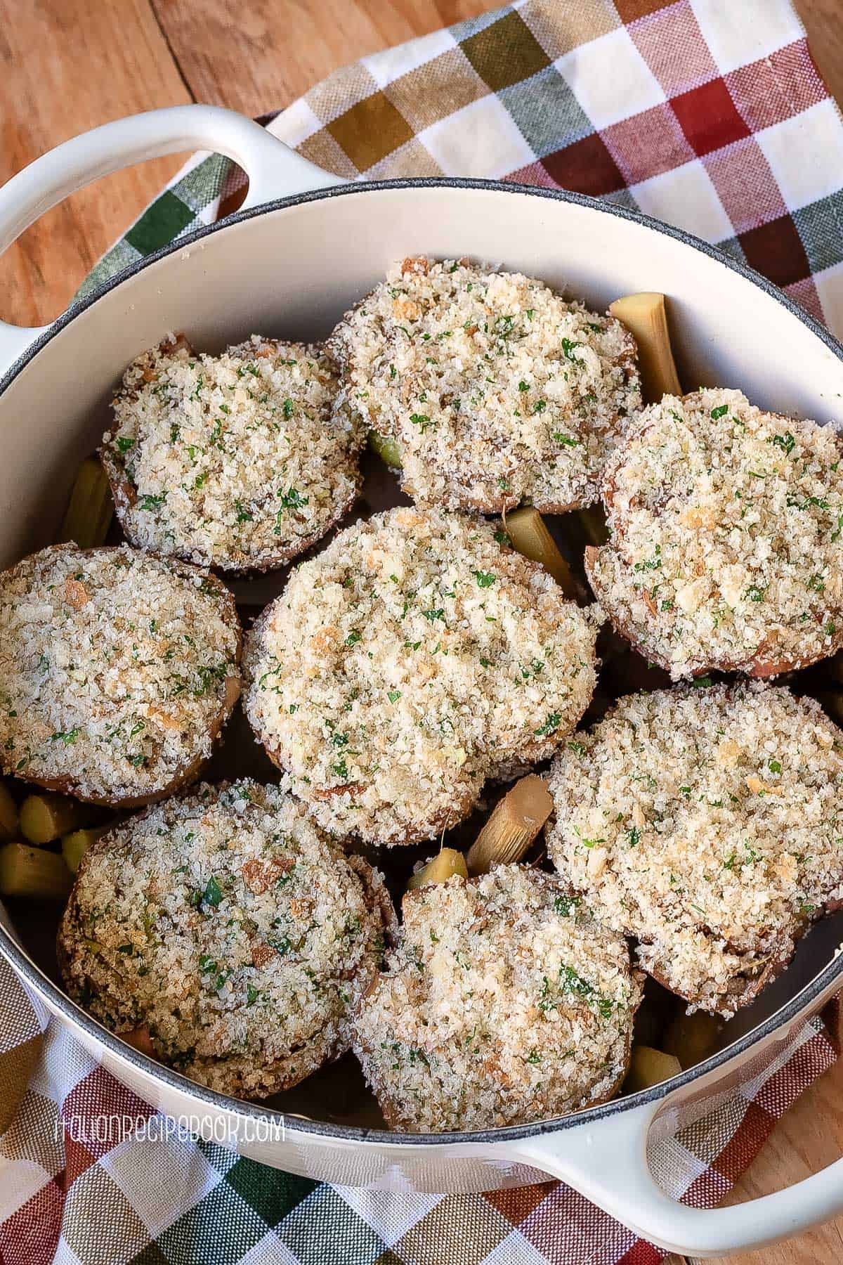 Stuffed artichokes in a dutch oven.