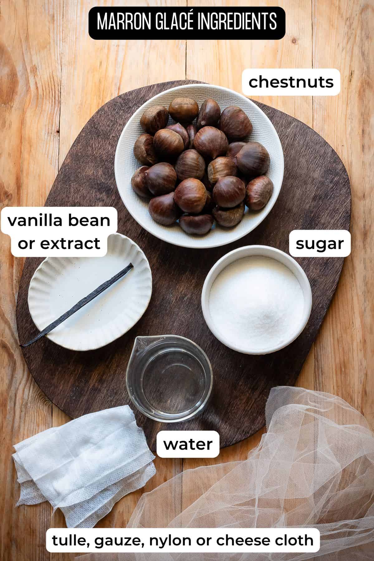 Ingredients needed to make marron glace laid on a wooden surface.