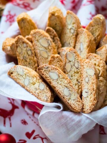 Cantucci almond biscotti in a small basket.