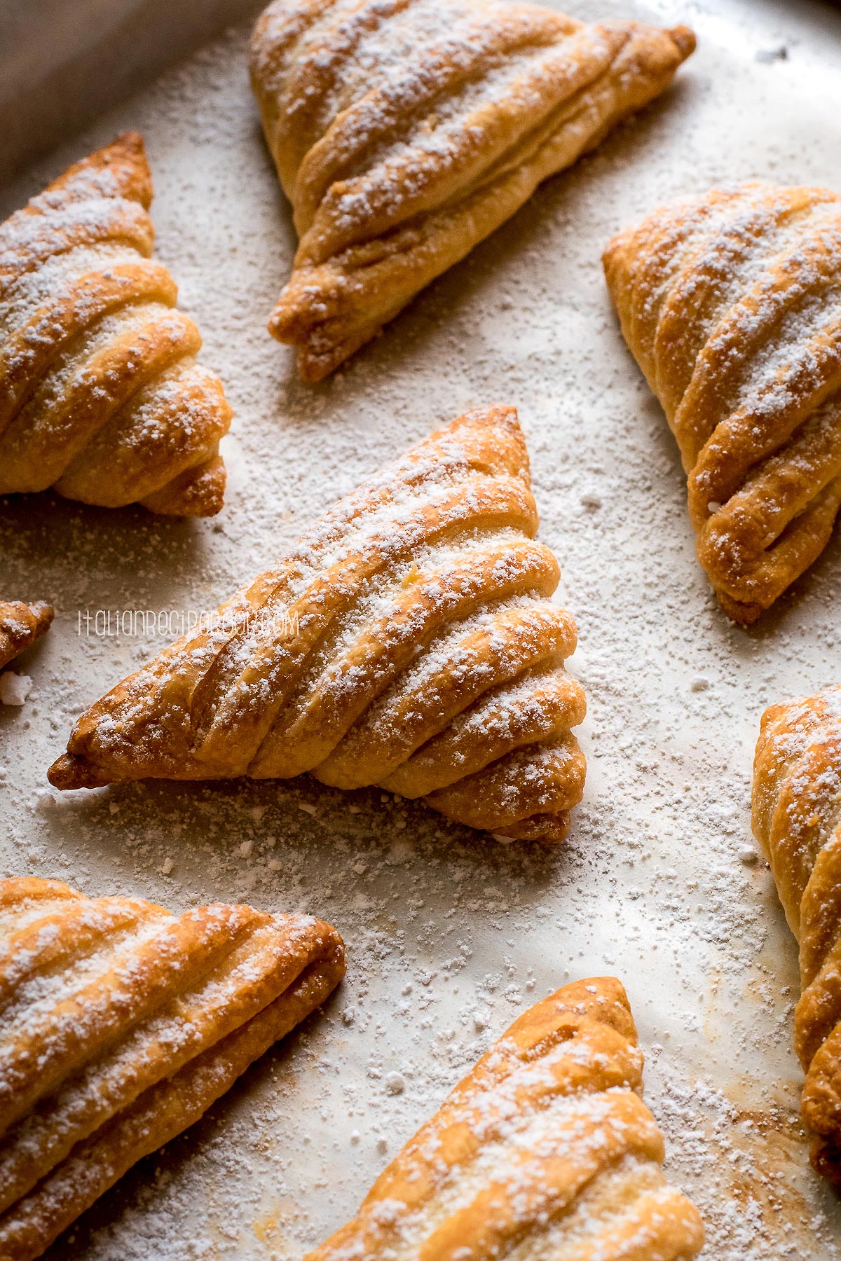 puff pastry sfogliatelle on a baking sheet