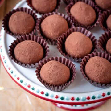 Chestnut chocolate truffles on a Christmas tray.