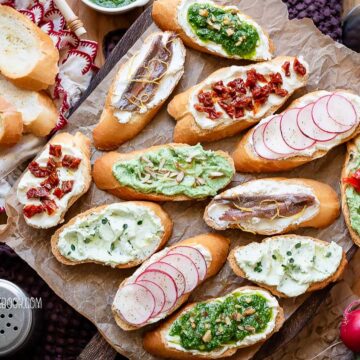 Whipped ricotta crostini with assorted toppings.