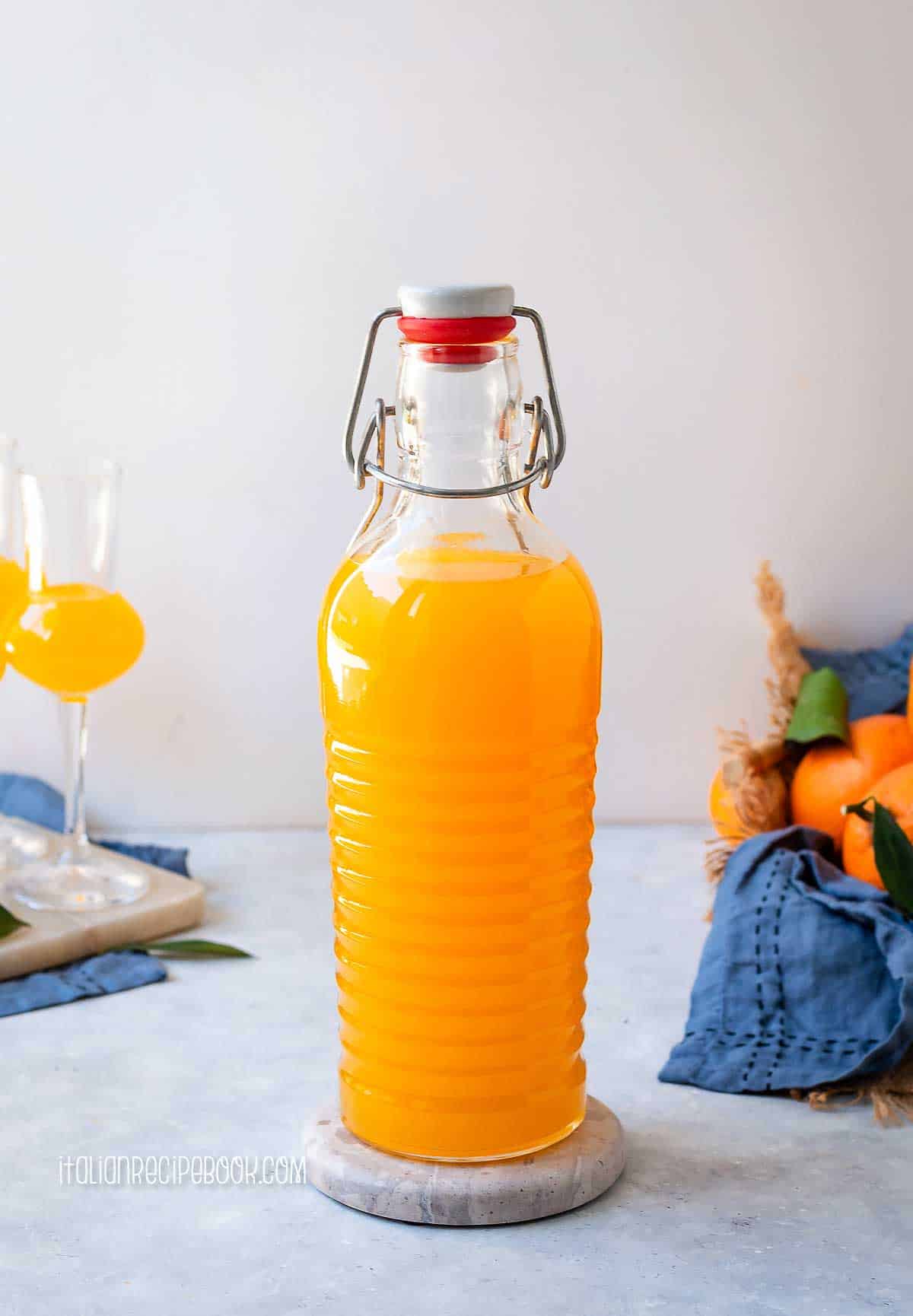 Orangecello liqueur in a swing-top bottle.