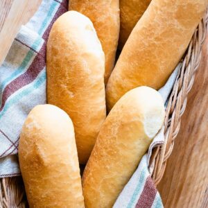 Panini bread rolls in a basket.