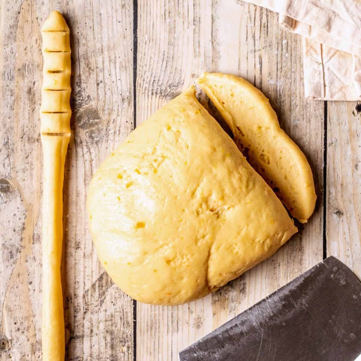 Cutting the dough for shaping.