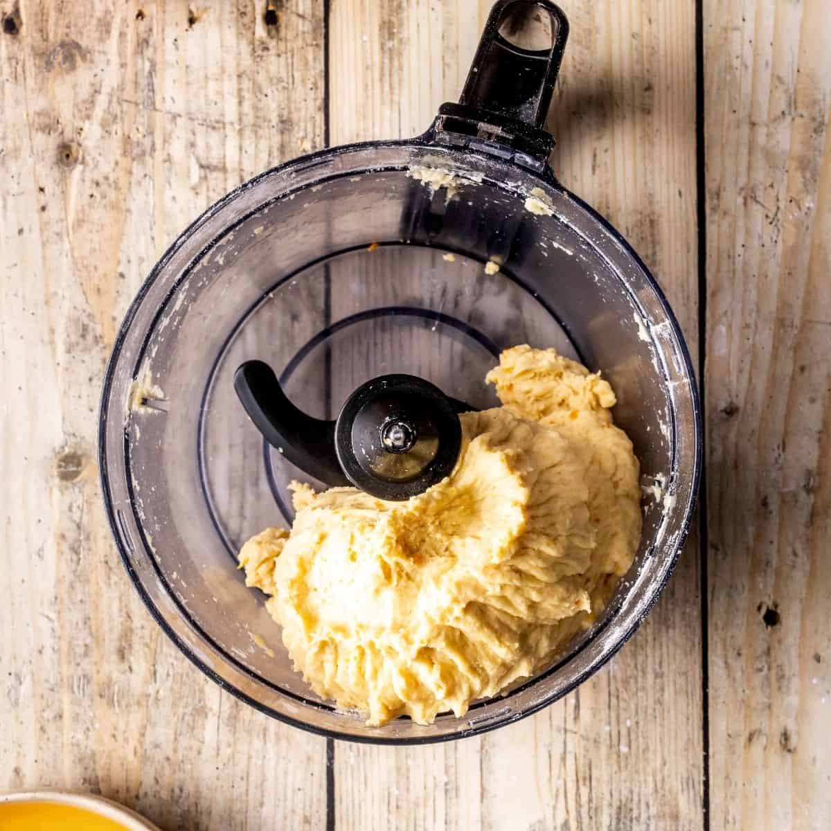 Struffoli dough in a food processor.