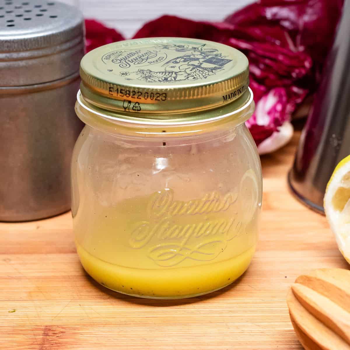 Citronette dressing in a glass jar.