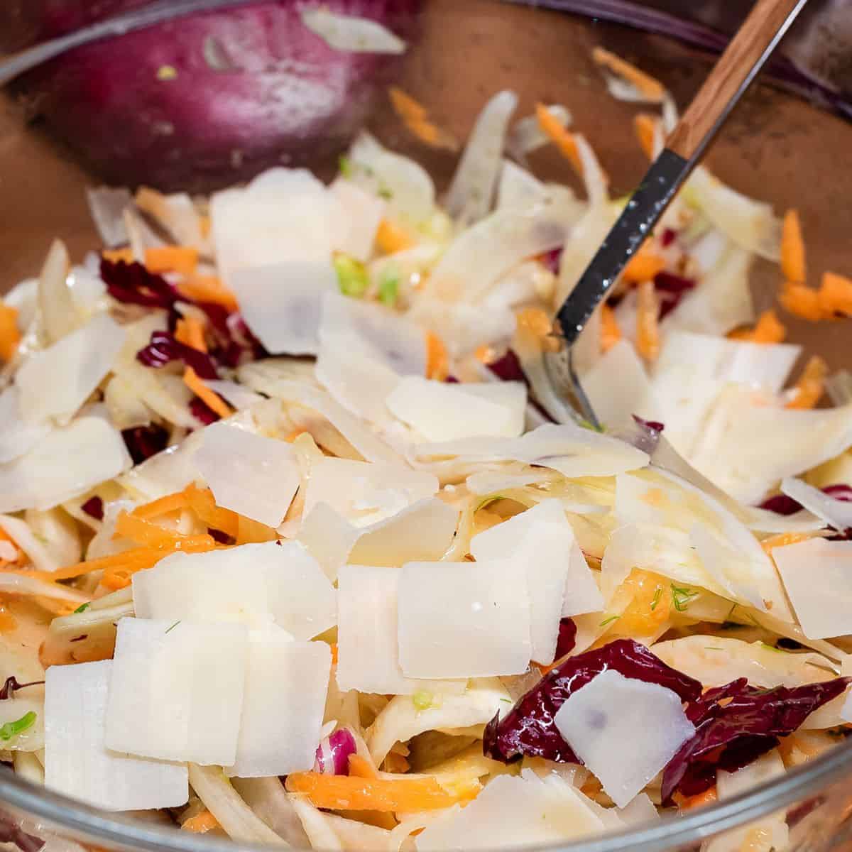 Radicchio salad topped with shaved Parmesan.