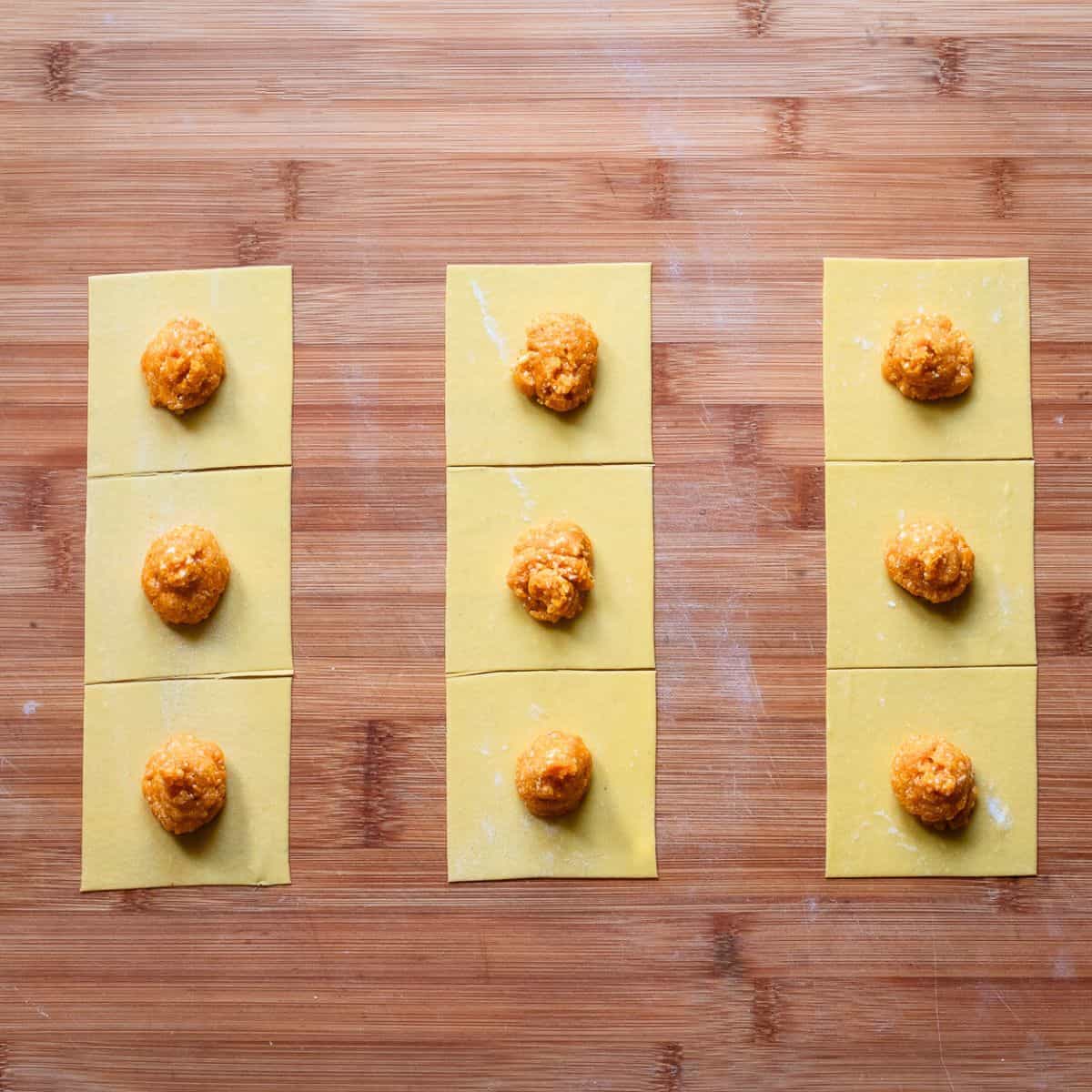 Pasta squares with roasted pumpkin filling.